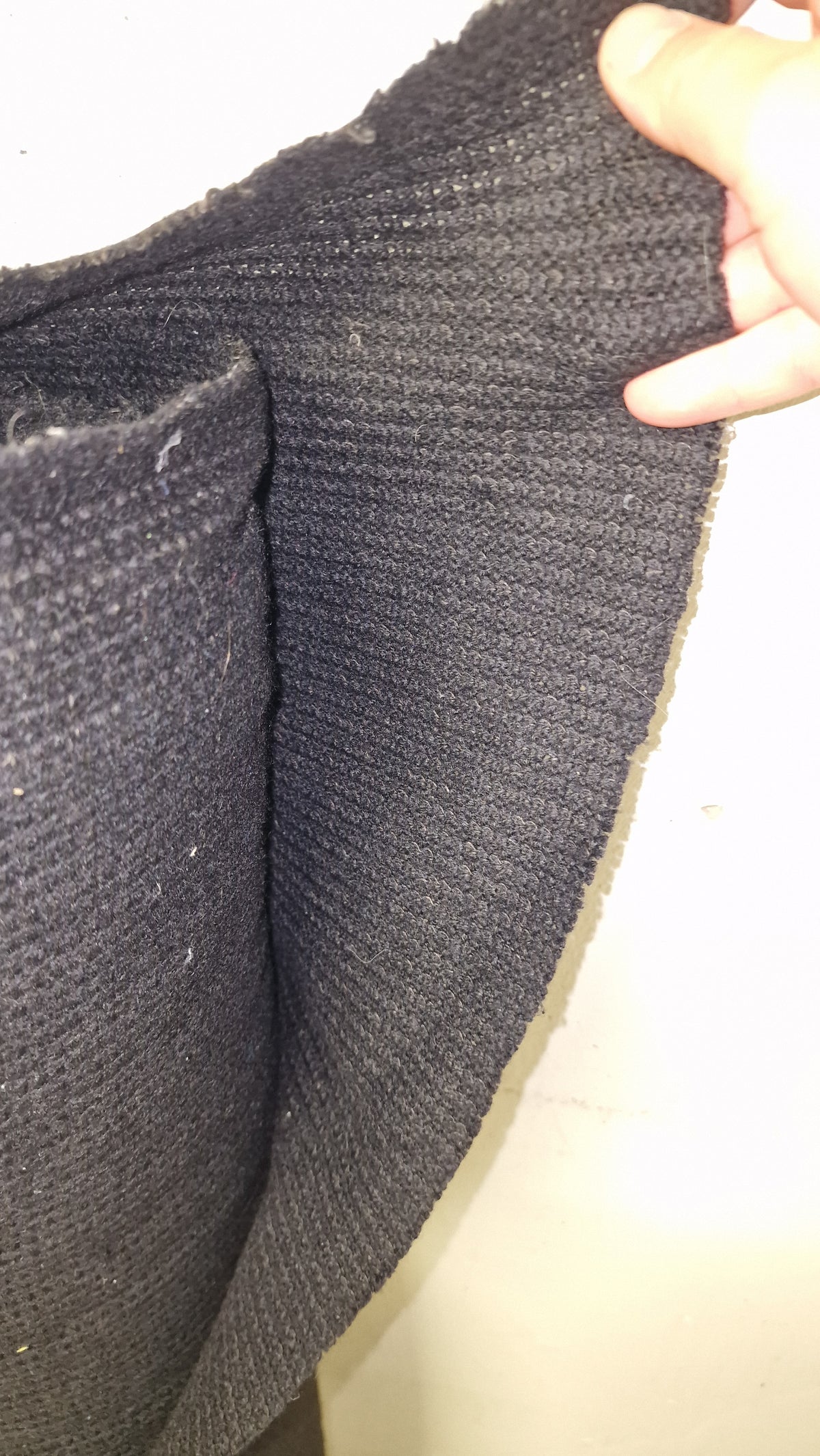 Schwarzer dicker Strickstoff